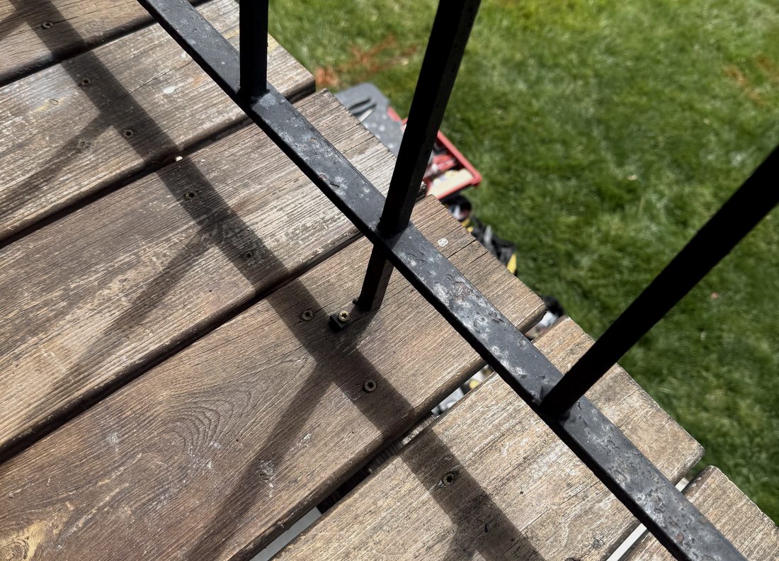 Metal cable railing system on a rebuilt deck
